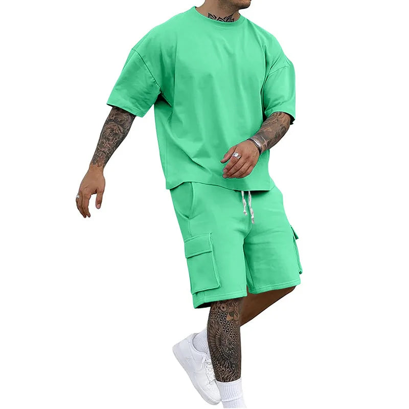 Nuevo estilo de verano, camiseta de moda y pantalones cortos de utilidad, conjunto de Color sólido, un traje informal y deportivo para hombre