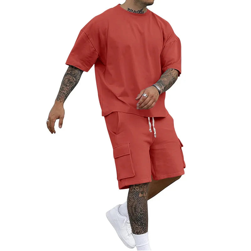 Nuevo estilo de verano, camiseta de moda y pantalones cortos de utilidad, conjunto de Color sólido, un traje informal y deportivo para hombre