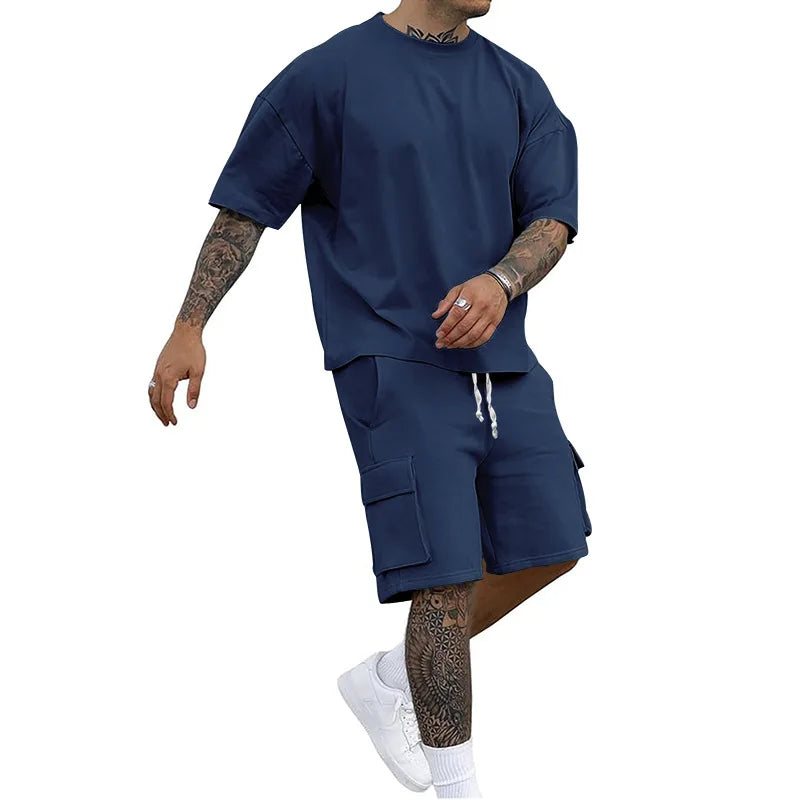 Nuevo estilo de verano, camiseta de moda y pantalones cortos de utilidad, conjunto de Color sólido, un traje informal y deportivo para hombre