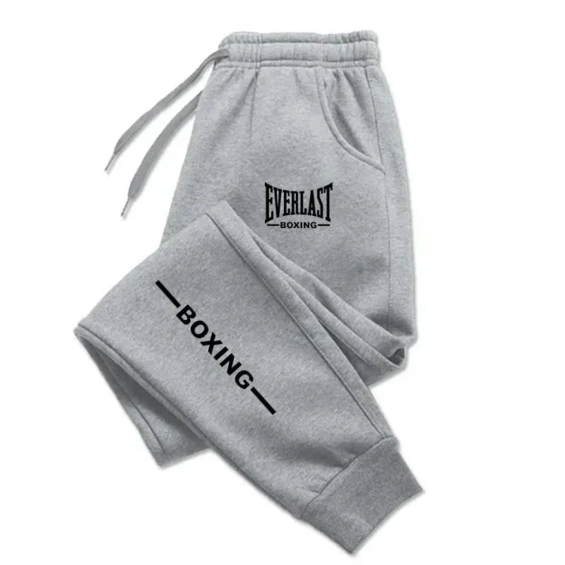 2025 Otoño Invierno EVERLAST pantalones para correr estampados hombres mujeres deportes al aire libre pantalones de Fitness correr polar pantalones deportivos casuales