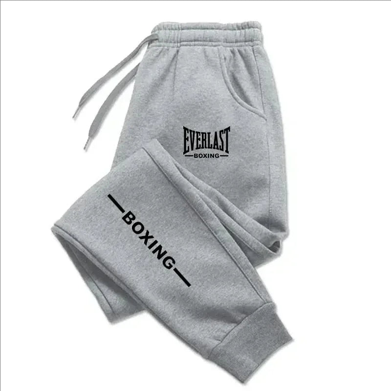 2025 Otoño Invierno EVERLAST pantalones para correr estampados hombres mujeres deportes al aire libre pantalones de Fitness correr polar pantalones deportivos casuales